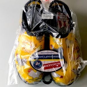 Sloggers BRAND NEW yellow chicken shoes.